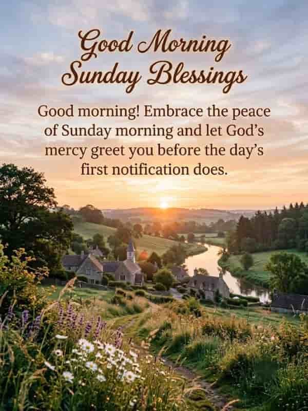 A peaceful Sunday morning landscape featuring a picturesque village with a small chapel, rolling green hills, a winding river, and a glowing sunrise, with text reading "Good Morning Sunday Blessings" and a message about embracing peace and God's mercy.