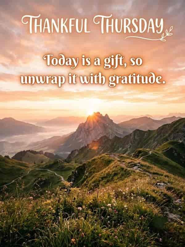 A serene sunrise over green mountain peaks with soft golden light filling the sky, featuring the text "Thankful Thursday" and the caption "Today is a gift, so unwrap it with gratitude."